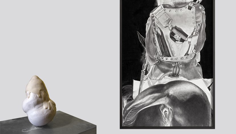 A photo of an amorphous statue and painting of a headless figure riding a horse, shown from from behind