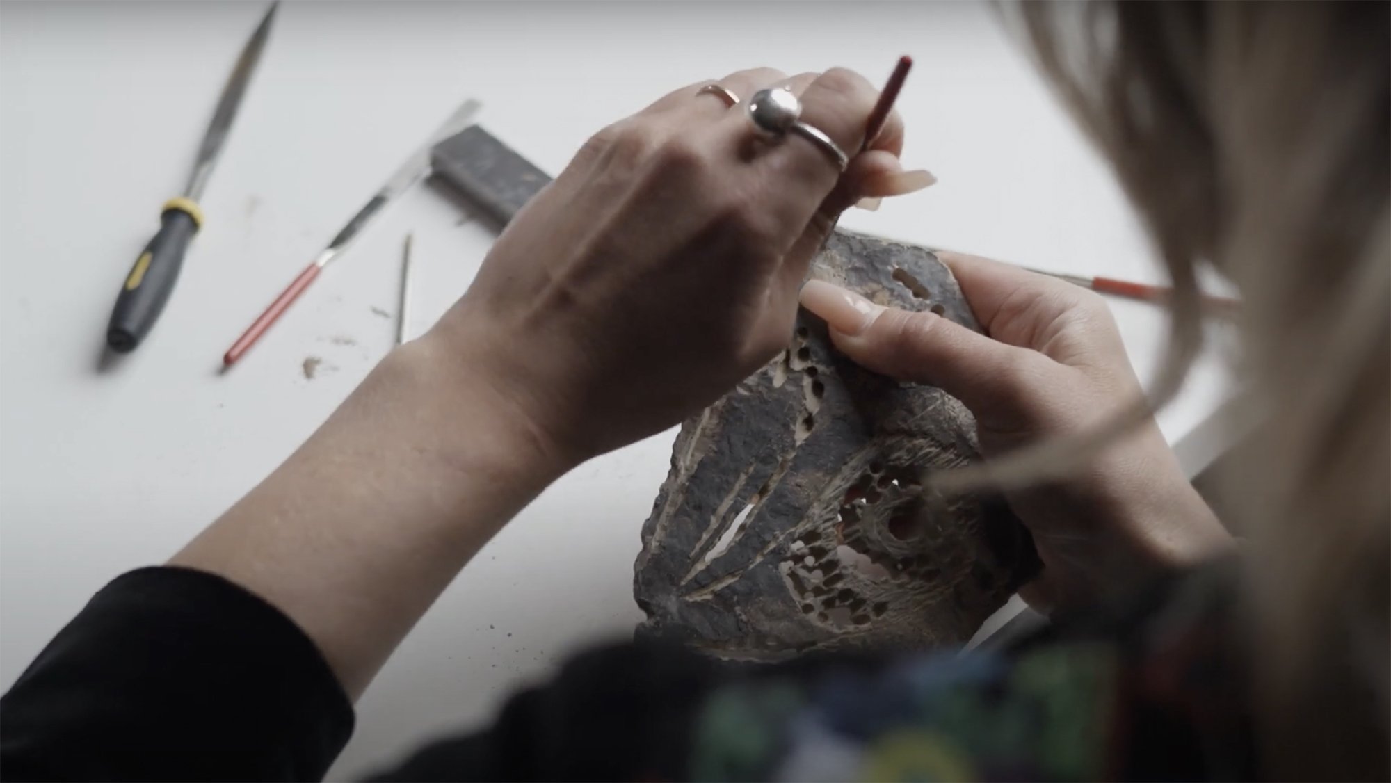 Sabina Petit Balcaityte carving a stone