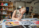 Student working on creative collaging
